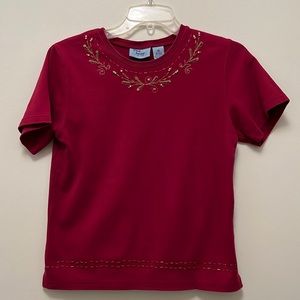 Jane Ashley ladies top. Flexible wear. Burgundy w gold embellishments. Size M